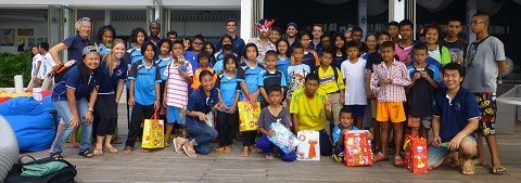 The team at one of the birthday parties we organise. Most of these children would otherwise not have a birthday party, cake nor any gifts at all